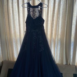 2 piece dark blue with beautiful sequins. Size 7